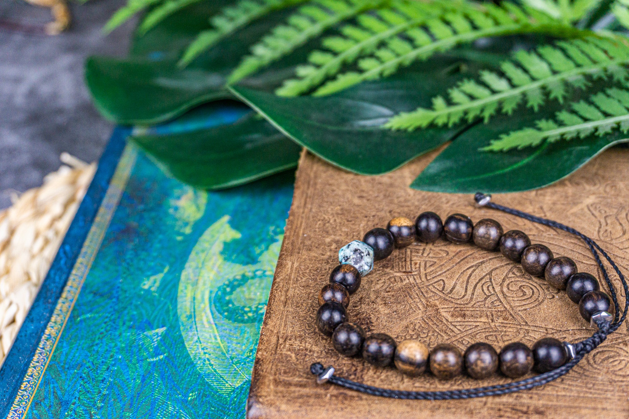 ebony wood beaded bracelet with cental kiwi jasper crystalbead
