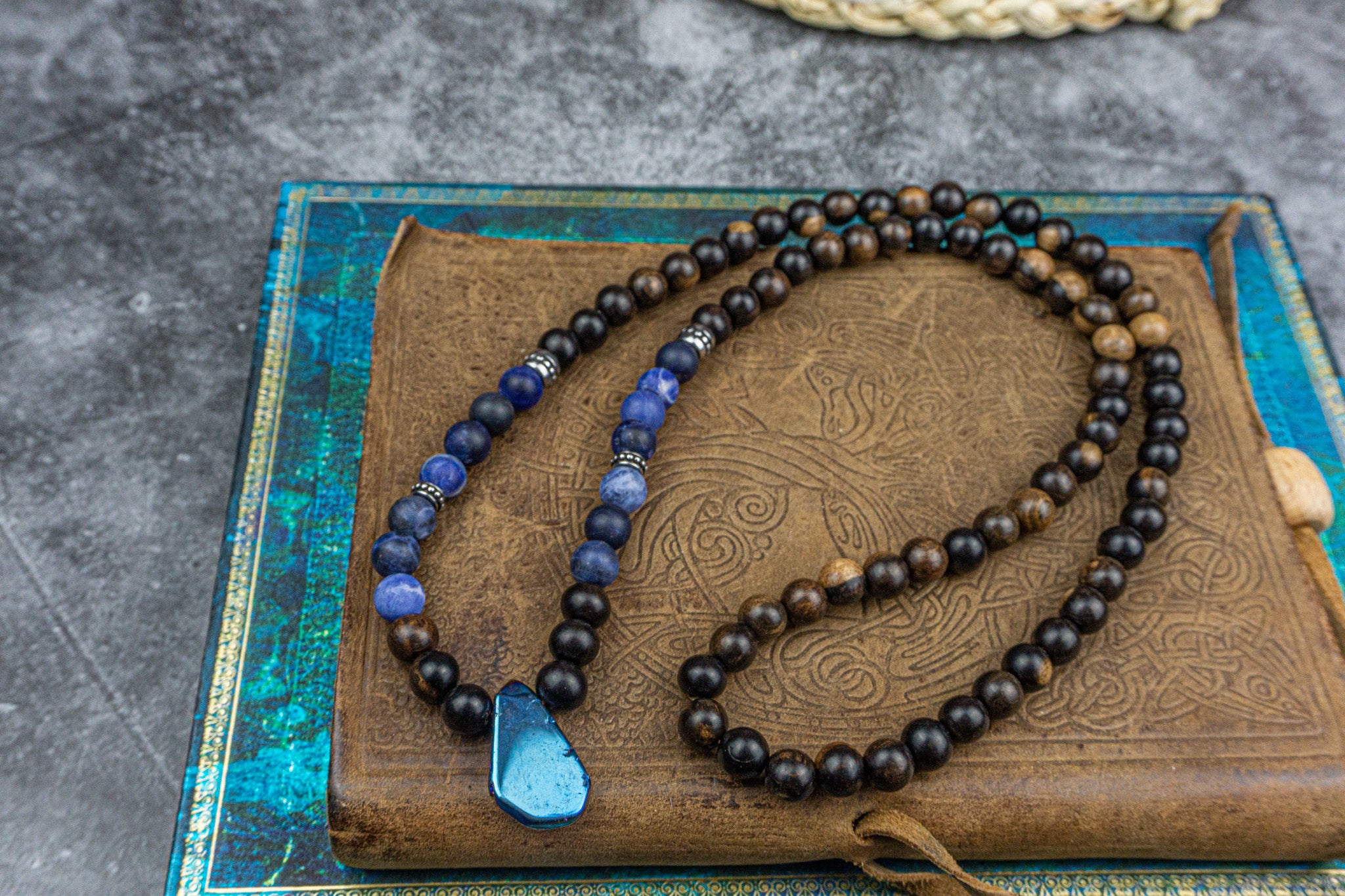 mens ebony wood, sodalite gemstone and stainless steel beaded necklace with quartz crystal as central pendant