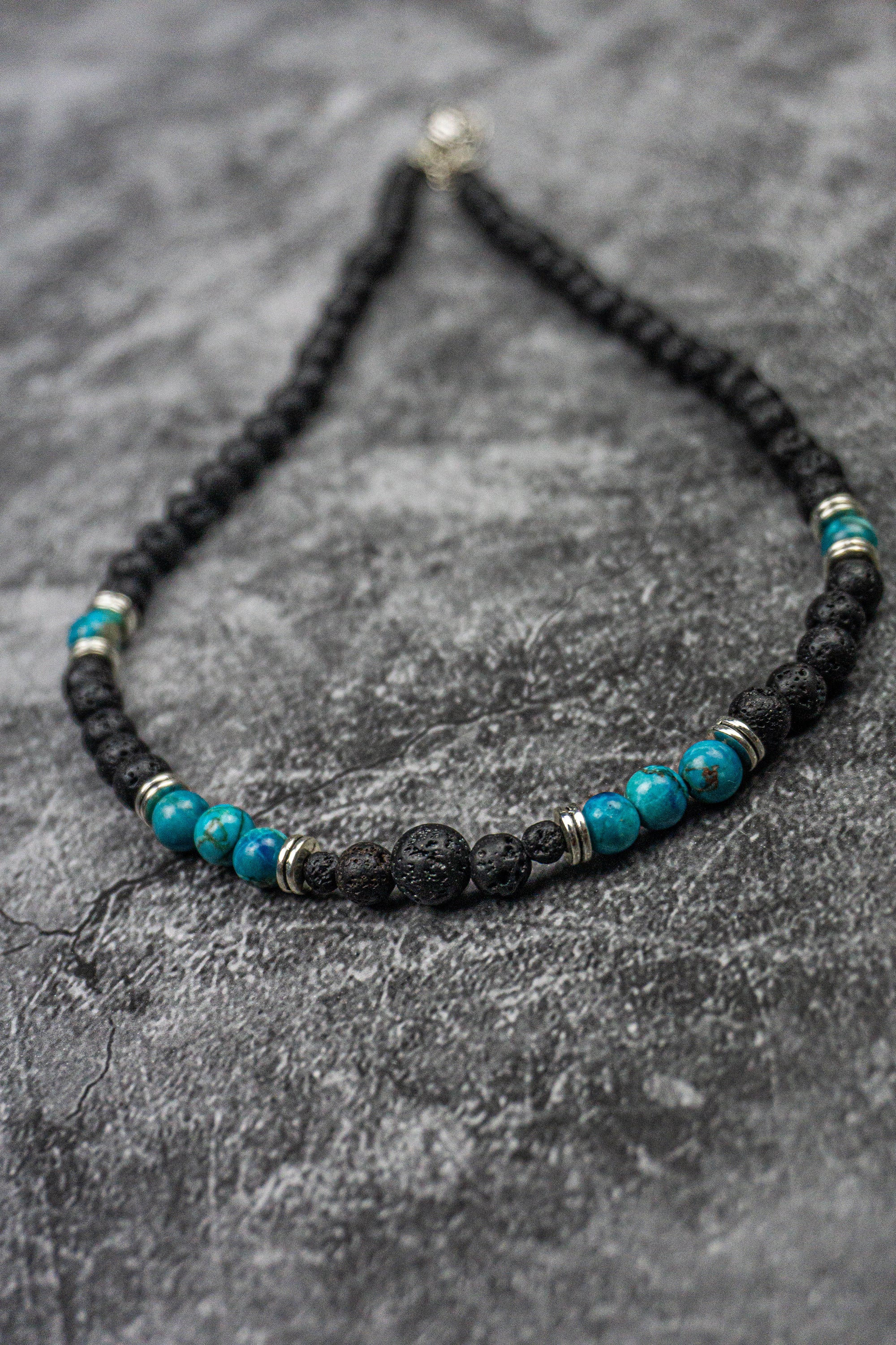 lava stone and turquoise ocean jasper gemstone beaded necklace with silver colored spacer beads- wander jewellery
