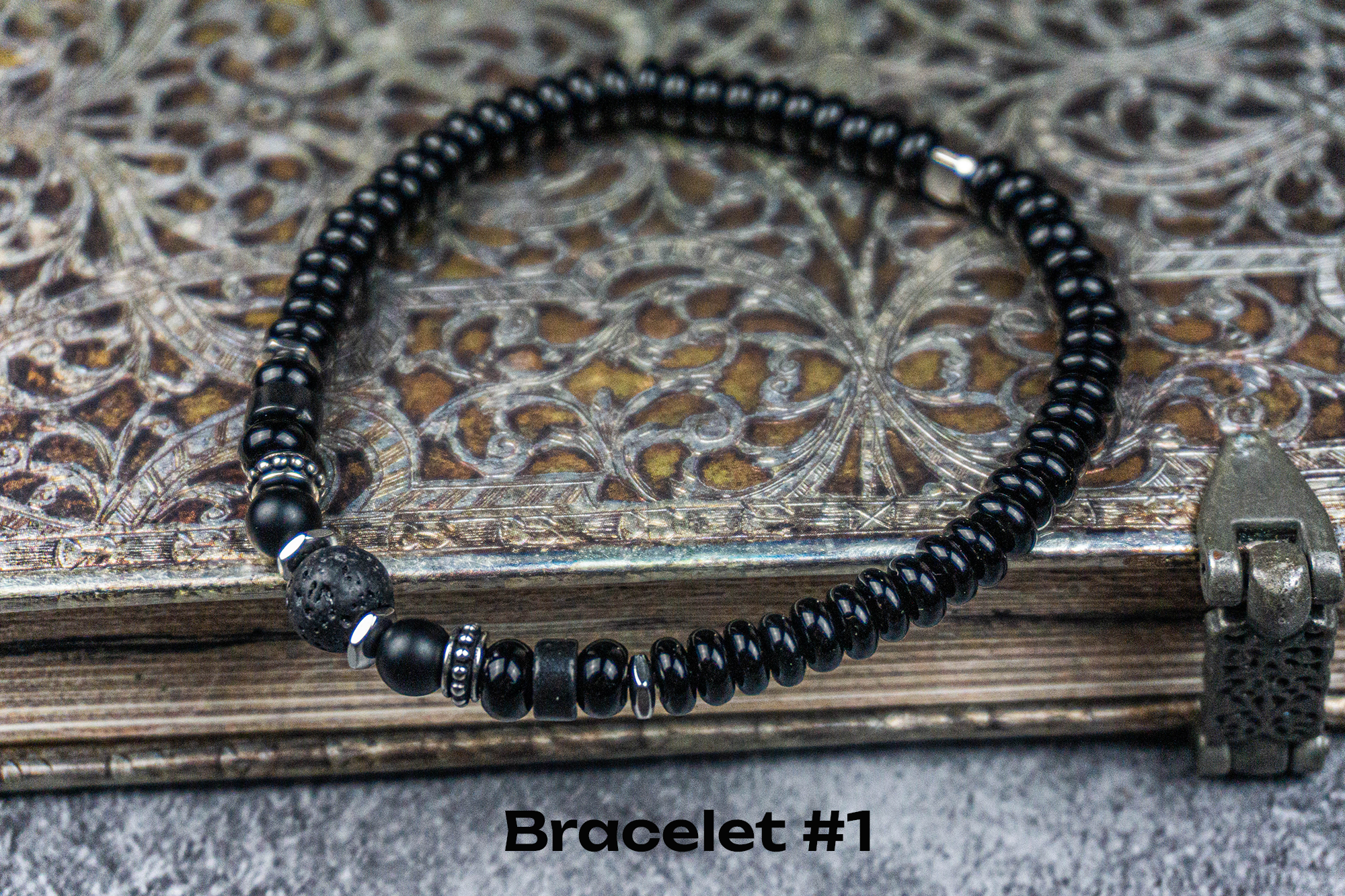 all black onyx and lava stone and stainless steel beaded bracelet 