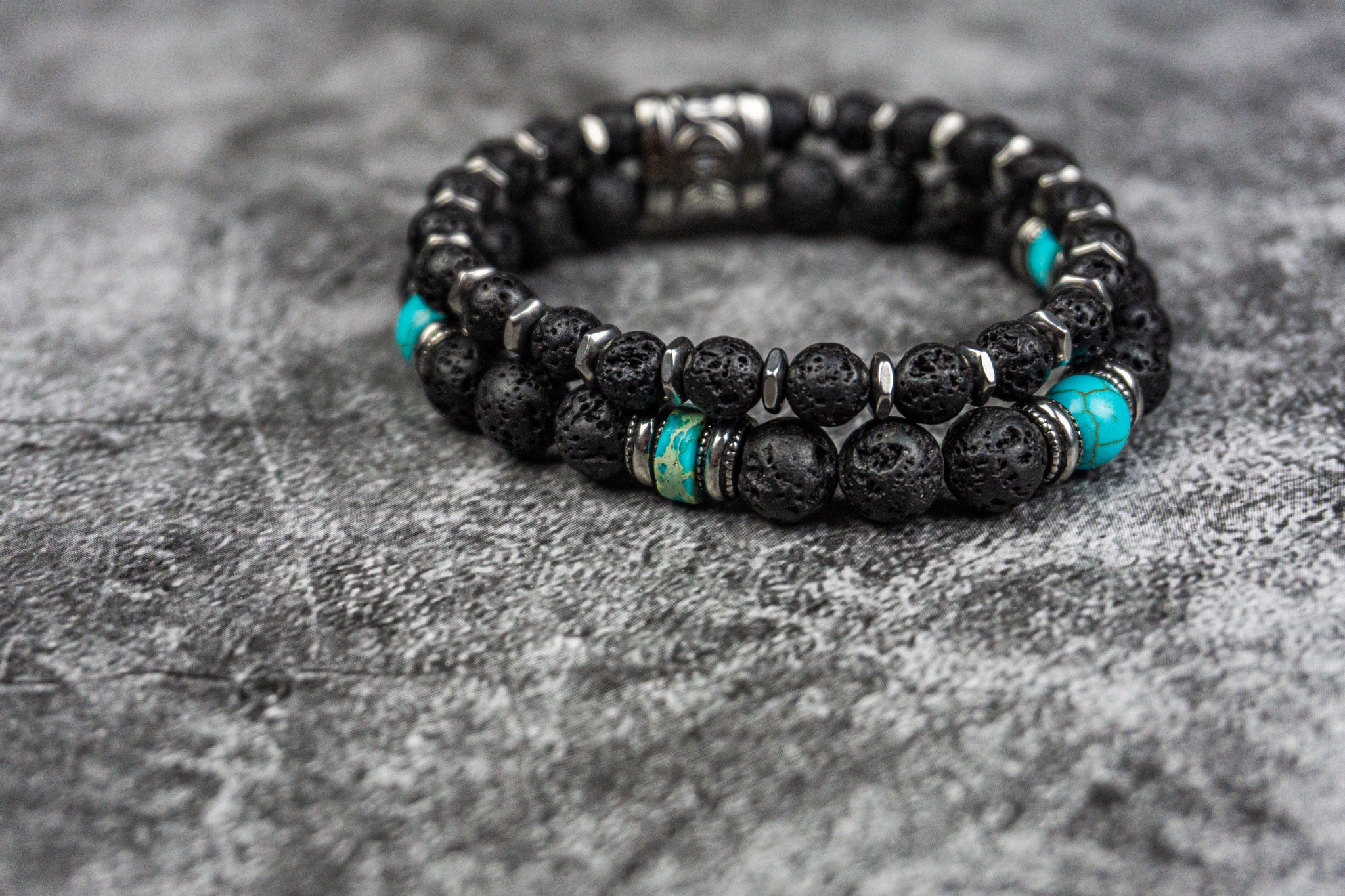 black bracelet set with lava stone, tuquoise and stainless steel beads- wander jewellery