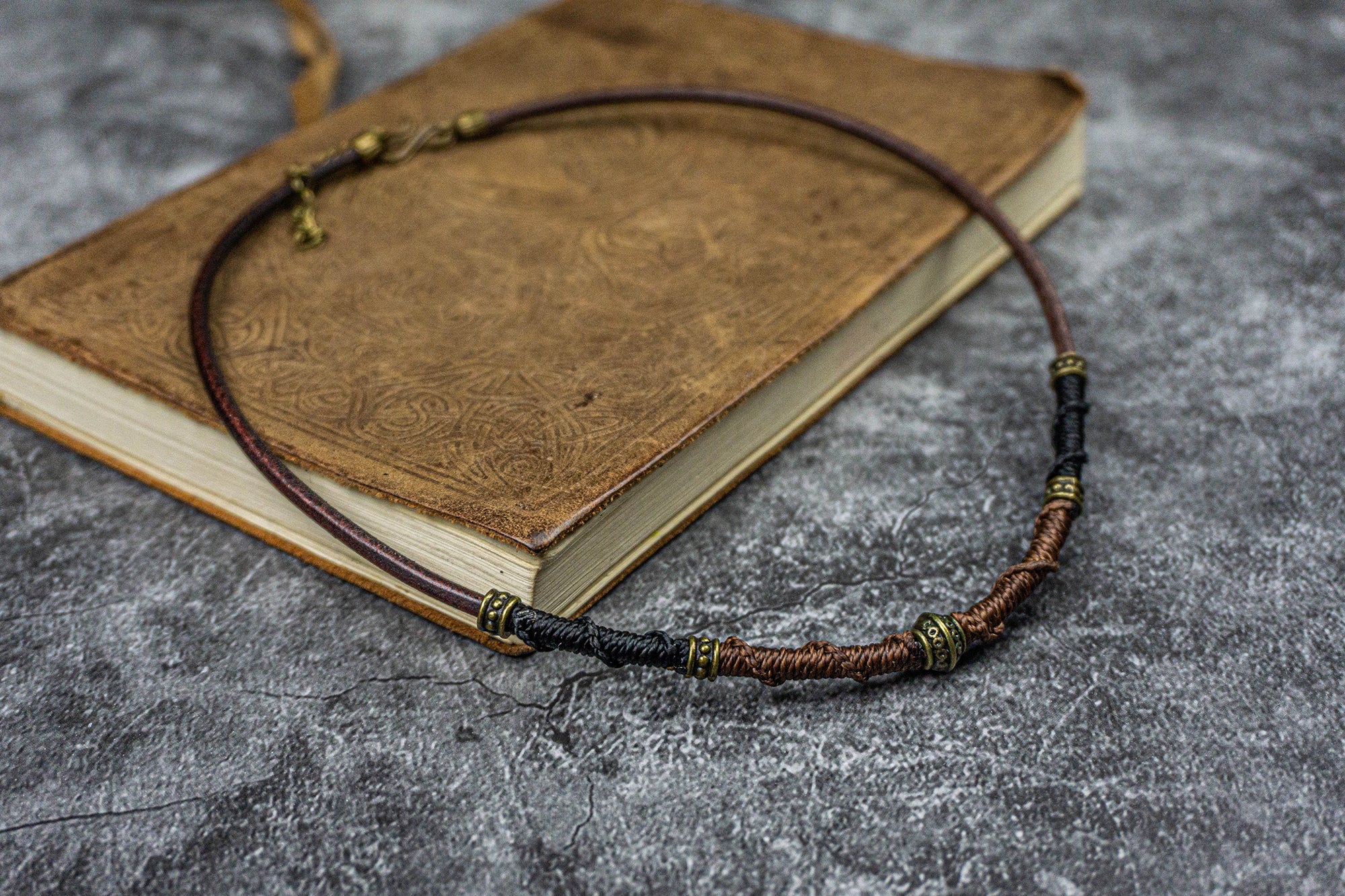 brown chunky choker necklace for men and women with bronze details and woven cotton ecoration