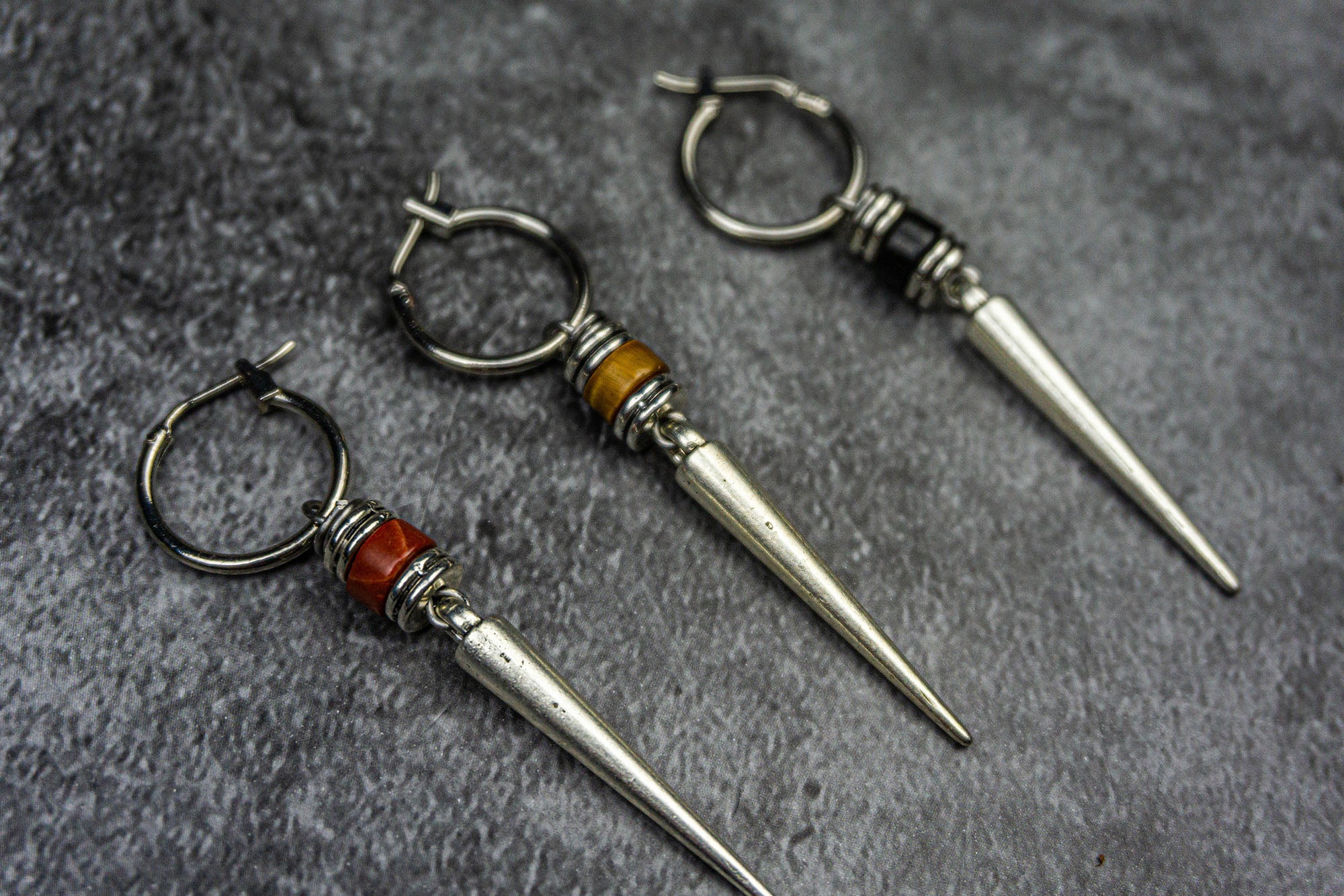 hoop earrings with long dangle silver spike and gemstone 