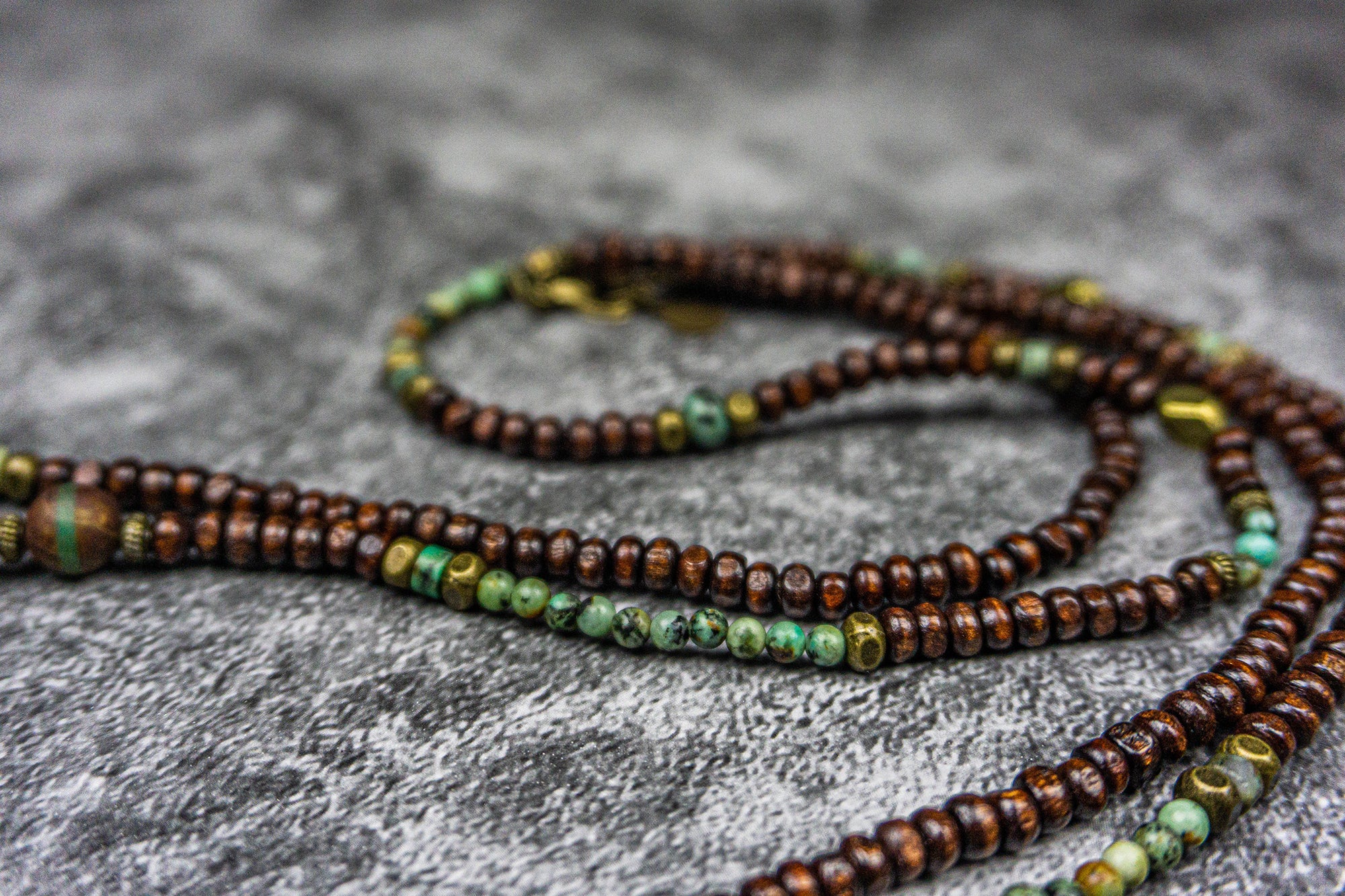 necklace made of wood and green gemstone bads and bronze spacer beads- wander jewellery