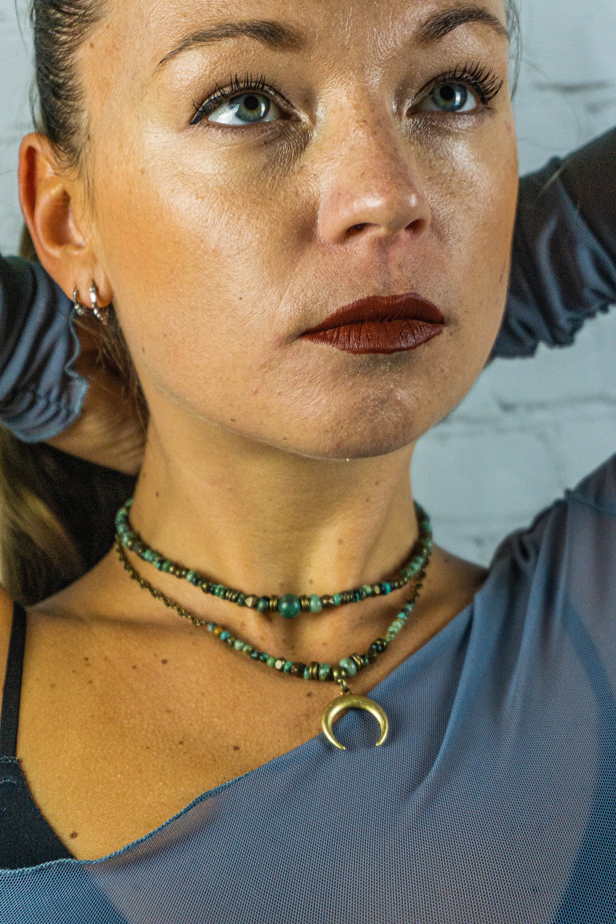 womens boho double necklace set made of green african turquoise and jade, with a crescent moon antique bronze pendant